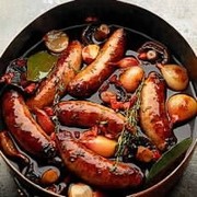 Venison Sausages Braised in Red Wine