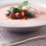 Chilled Strawberry Soup with Drunken Berries and Peppered Whipped Cream