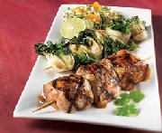 Honey-garlic pork tenderloin brochettes, bok choy brochettes and mandarin rice